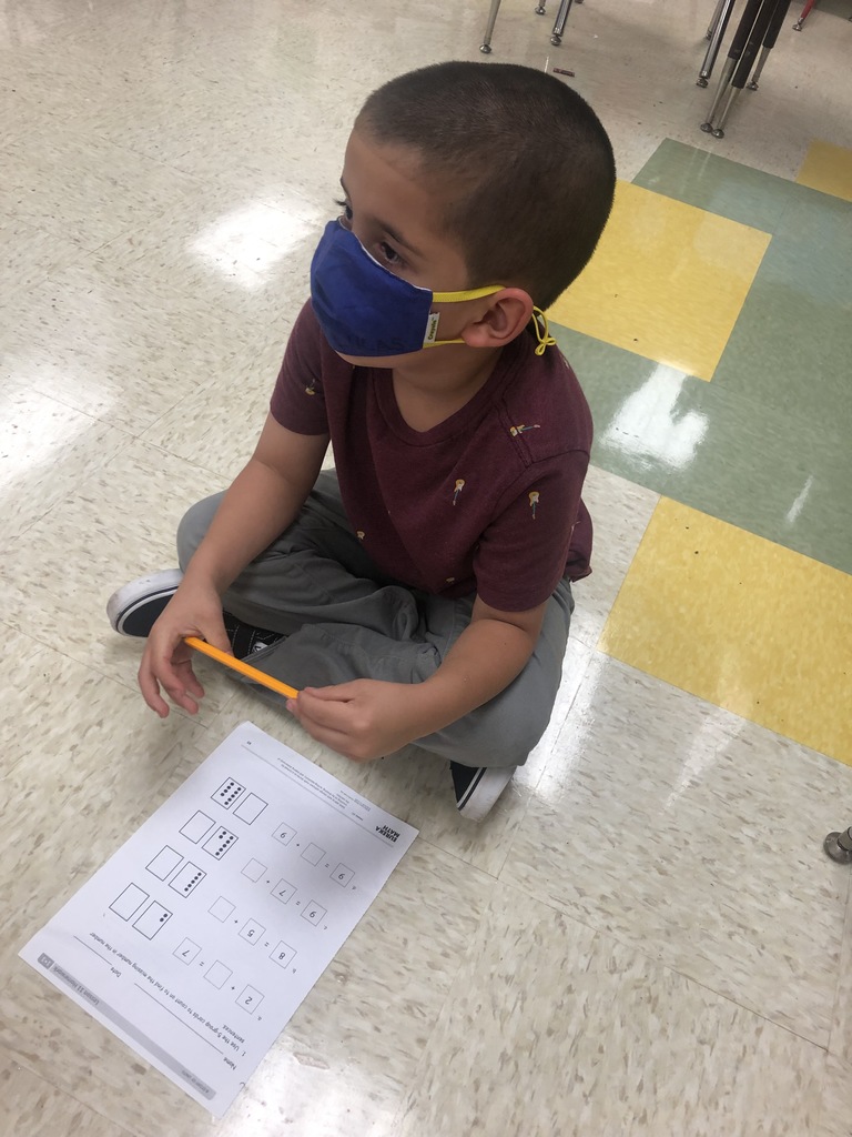 Lucas learning how to count on in Math.