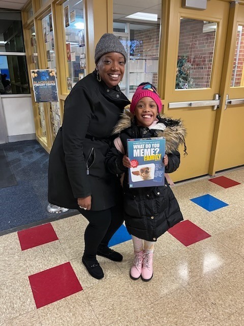 Mom and daughter with books