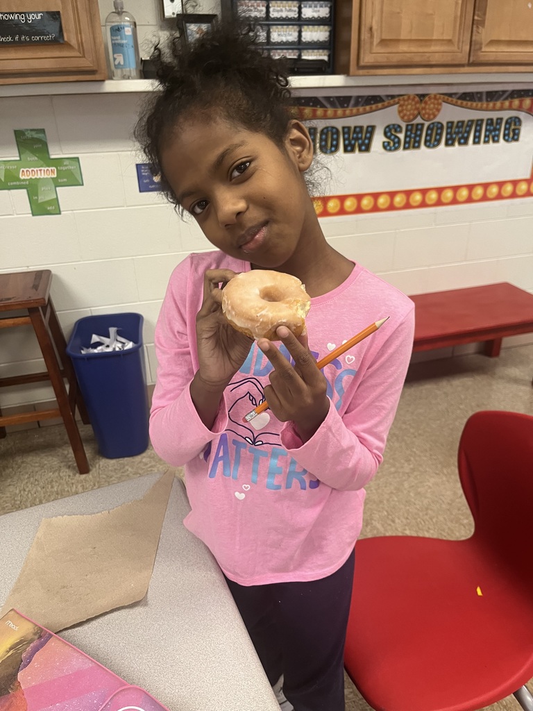 4th grader with donut